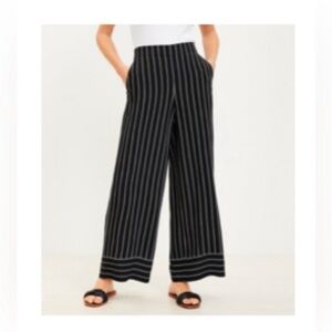 Black Striped Women's Pants fluid wide leg. Size L. Loft.  Excellent condition.